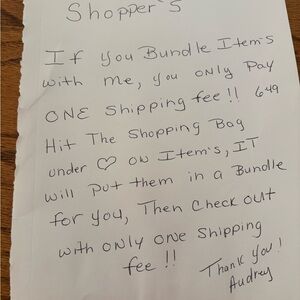 Handwritten Note on White Paper